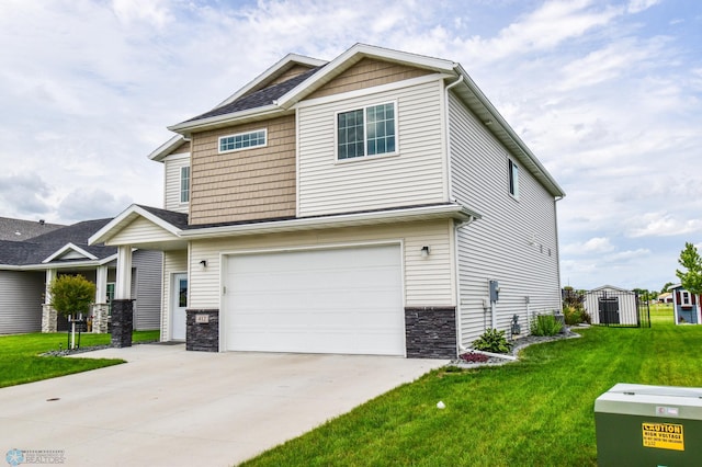 412 Hampton Dr W, Moorhead, MN 56560 - craftsman-style house with an attached garage, a front yard, concrete driveway, and stone siding