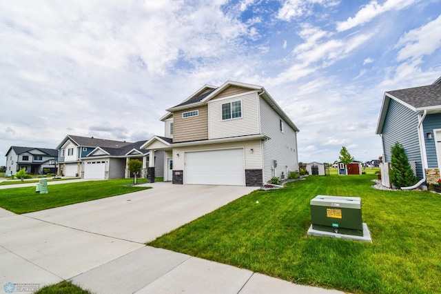 412 Hampton Dr W, Moorhead, MN 56560 - craftsman-style house with stone siding, concrete driveway, a garage, and a front lawn