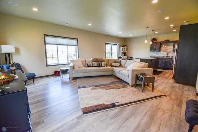 412 Hampton Dr W, Moorhead, MN 56560 - living area with light wood-style floors and recessed lighting