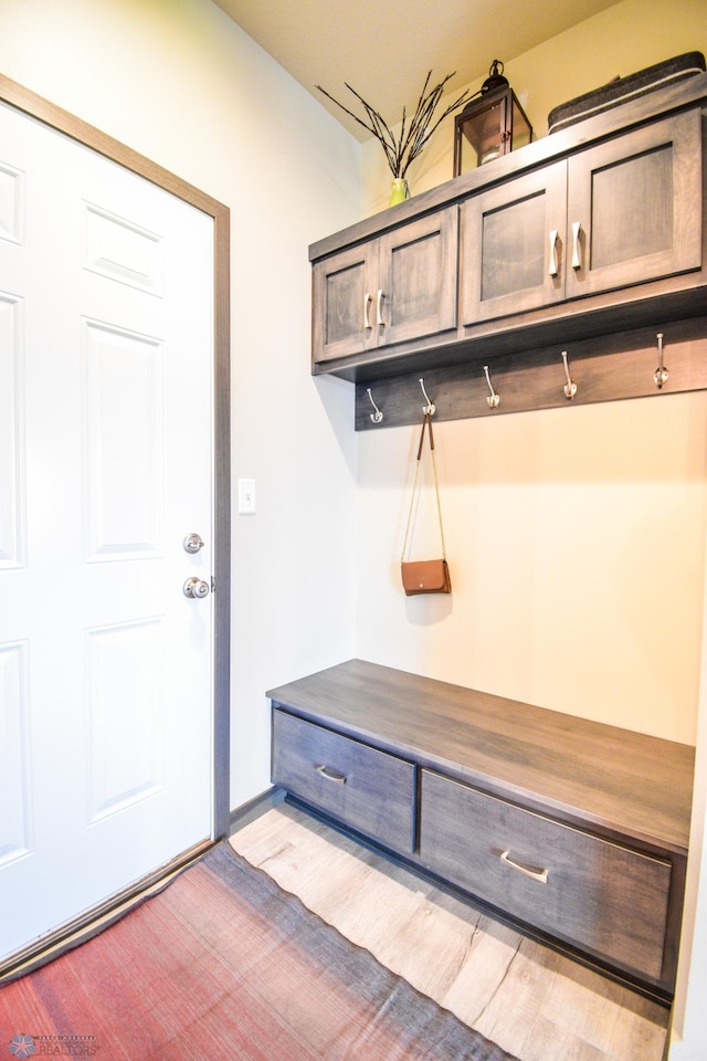 412 Hampton Dr W, Moorhead, MN 56560 - mudroom featuring wood finished floors and baseboards