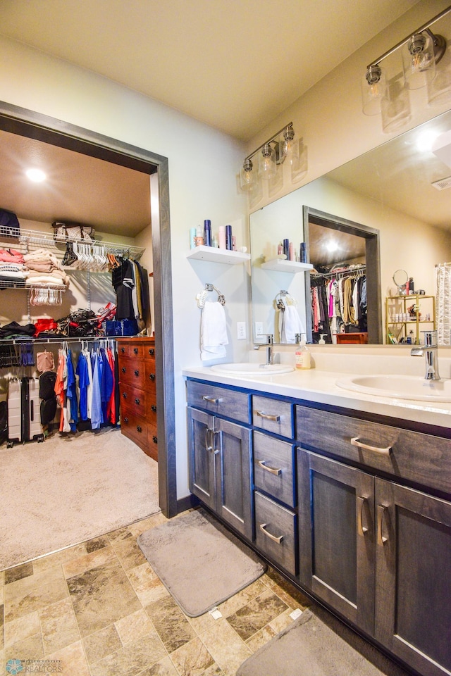 412 Hampton Dr W, Moorhead, MN 56560 - full bath with double vanity and a spacious closet