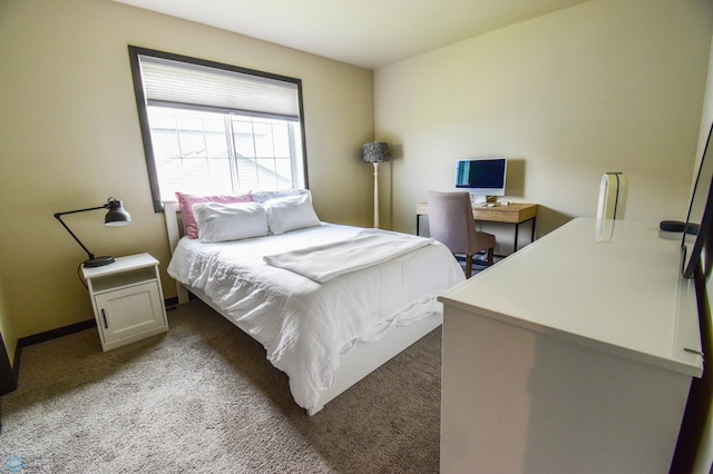 412 Hampton Dr W, Moorhead, MN 56560 - bedroom featuring light carpet and baseboards