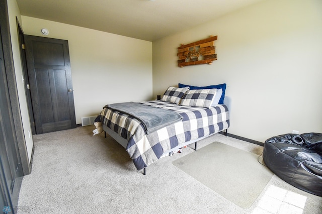 412 Hampton Dr W, Moorhead, MN 56560 - carpeted bedroom with baseboards
