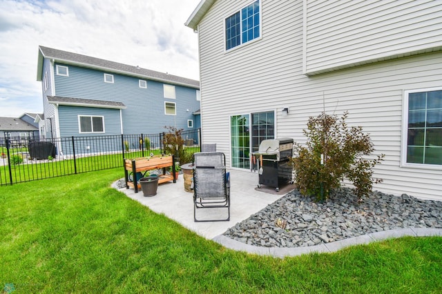 412 Hampton Dr W, Moorhead, MN 56560 - rear view of house with a patio area