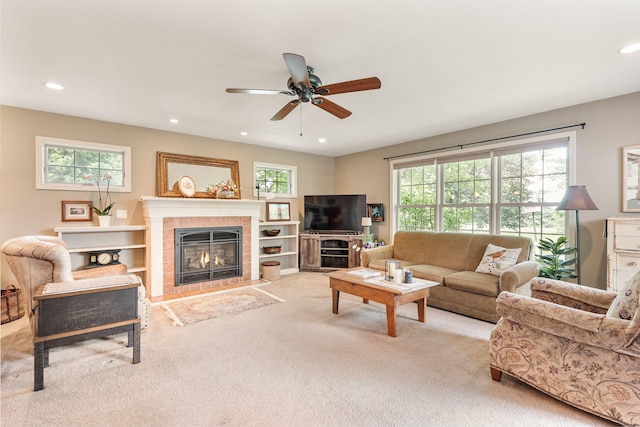 56668 145th Ave, West Concord, MN 55985 - living room featuring a fireplace, carpet floors, a ceiling fan, and recessed lighting