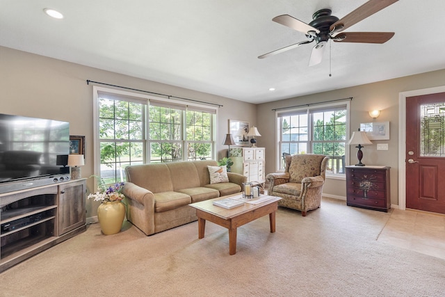 56668 145th Ave, West Concord, MN 55985 - living room with light colored carpet, ceiling fan, and recessed lighting