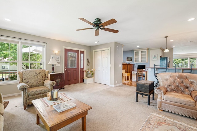 56668 145th Ave, West Concord, MN 55985 - living area with light carpet, recessed lighting, and a ceiling fan