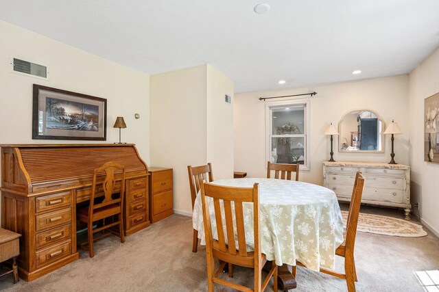 56668 145th Ave, West Concord, MN 55985 - dining area with light colored carpet, an office area, and recessed lighting