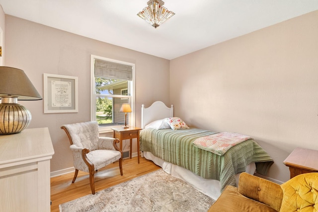 56668 145th Ave, West Concord, MN 55985 - bedroom featuring wood finished floors and baseboards