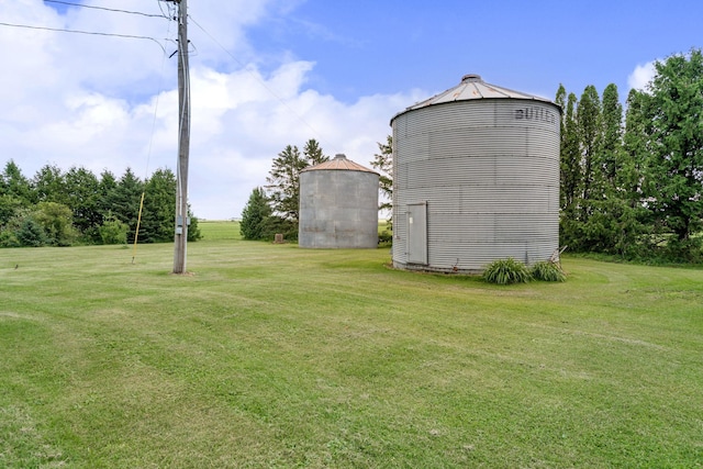 56668 145th Ave, West Concord, MN 55985 - view of grassy yard featuring an outdoor structure