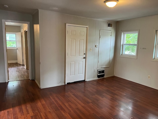 1026 Fremont Ave, Saint Paul, MN 55106 - spare room with plenty of natural light, dark wood-style flooring, a smoke detector, and crown molding