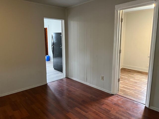 1026 Fremont Ave, Saint Paul, MN 55106 - spare room with wood finished floors and crown molding