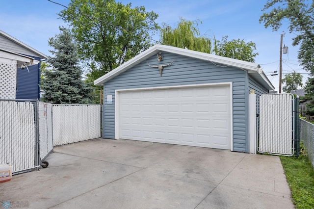 1330 16 1/2 St S, Fargo, ND 58103 - detached garage featuring a gate