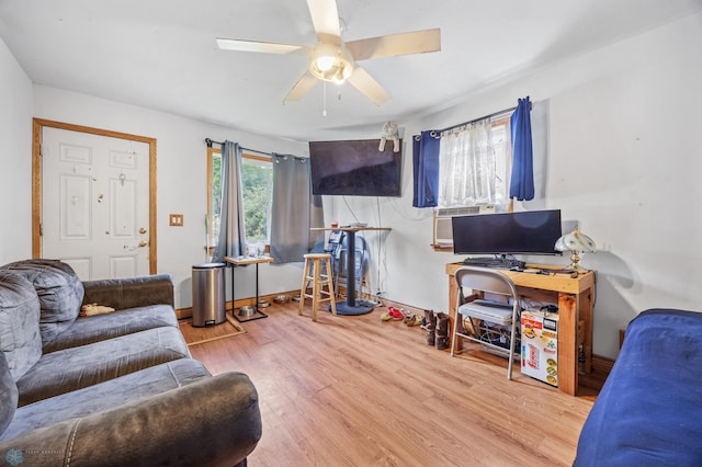 1330 16 1/2 St S, Fargo, ND 58103 - living room featuring wood finished floors, a ceiling fan, and cooling unit