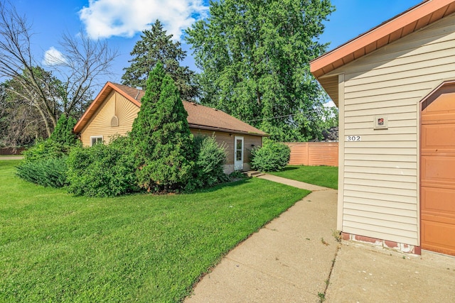 302 3rd Ave N, Bowlus, MN 56314 - view of yard featuring a garage