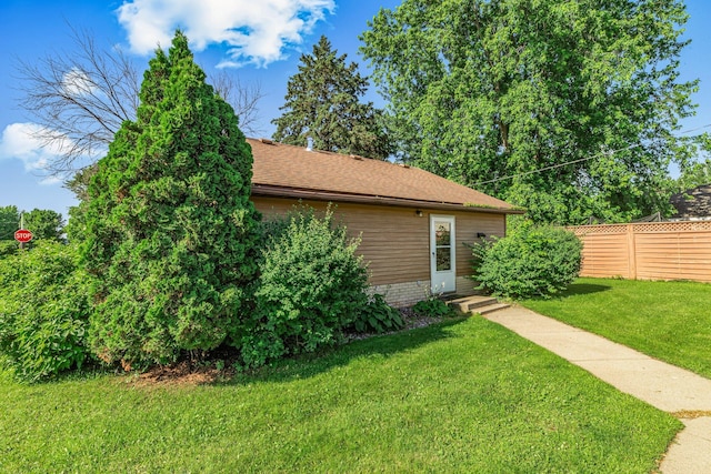 302 3rd Ave N, Bowlus, MN 56314 - view of front of home featuring roof with shingles and brick siding