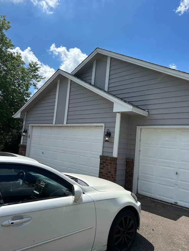 3324 131st Ln NW, Coon Rapids, MN 55448 - view of side of property with brick siding