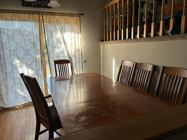 3324 131st Ln NW, Coon Rapids, MN 55448 - dining space featuring hardwood / wood-style flooring