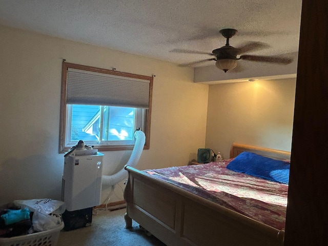 3324 131st Ln NW, Coon Rapids, MN 55448 - carpeted bedroom featuring a textured ceiling and ceiling fan