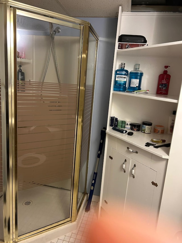 3324 131st Ln NW, Coon Rapids, MN 55448 - bathroom with a shower stall and tile patterned floors