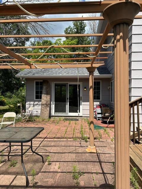 3324 131st Ln NW, Coon Rapids, MN 55448 - deck with a patio and a pergola
