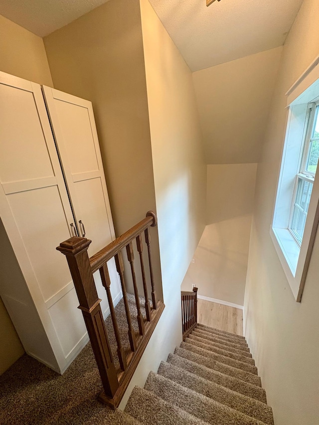 2812 150th St, Maxwell Twp, MN 56232 - staircase featuring lofted ceiling