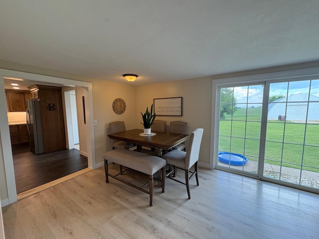 2812 150th St, Maxwell Twp, MN 56232 - dining space with wood finished floors