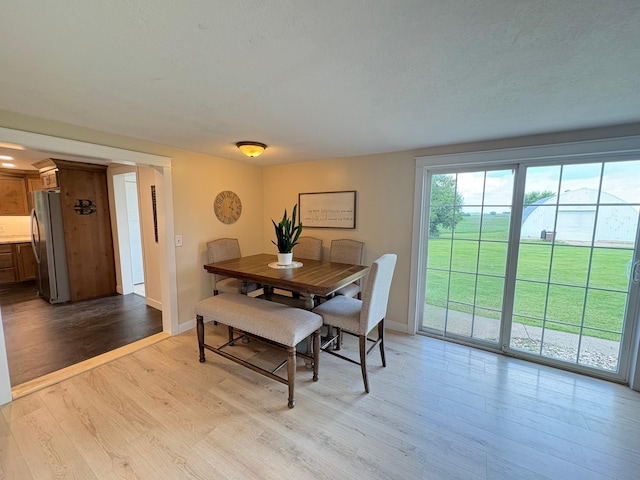 2812 150th St, Maxwell Twp, MN 56232 - dining room featuring wood finished floors
