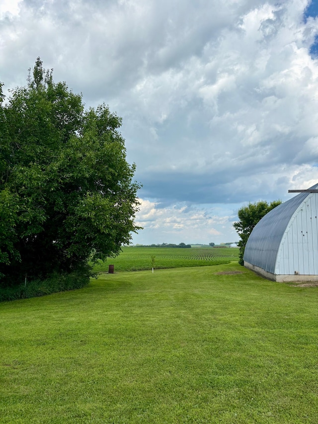 2812 150th St, Maxwell Twp, MN 56232 - view of green lawn with an outbuilding and a rural view