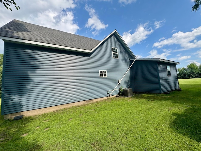 2812 150th St, Maxwell Twp, MN 56232 - back of house featuring a yard and a shingled roof