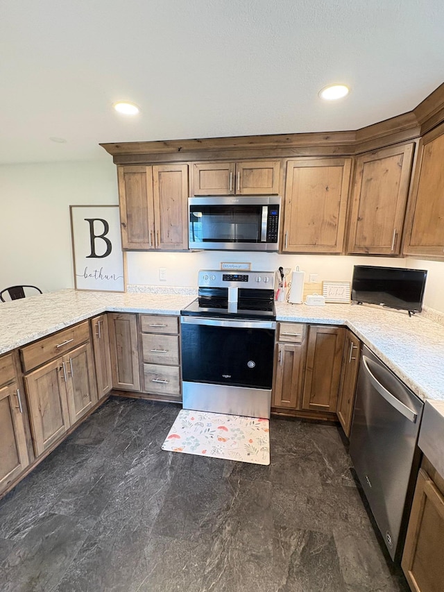2812 150th St, Maxwell Twp, MN 56232 - kitchen with stainless steel appliances, a peninsula, light stone countertops, and recessed lighting