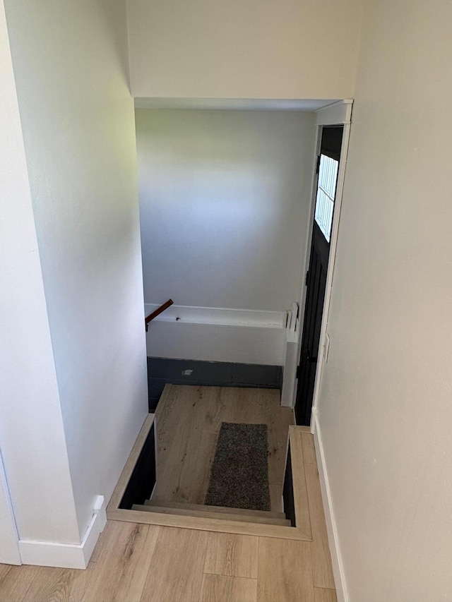 2812 150th St, Maxwell Twp, MN 56232 - stairway featuring wood finished floors and baseboards