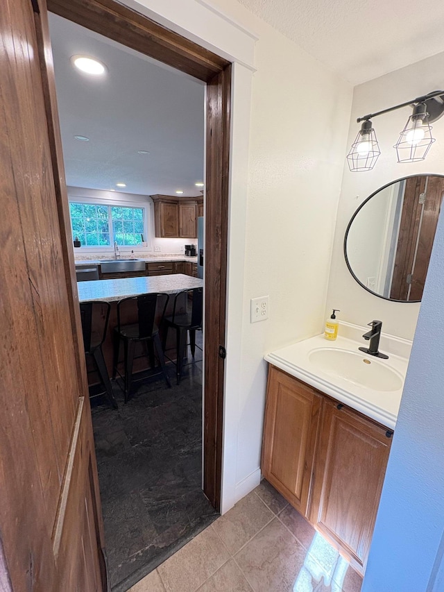 2812 150th St, Maxwell Twp, MN 56232 - bathroom featuring vanity, recessed lighting, and tile patterned floors