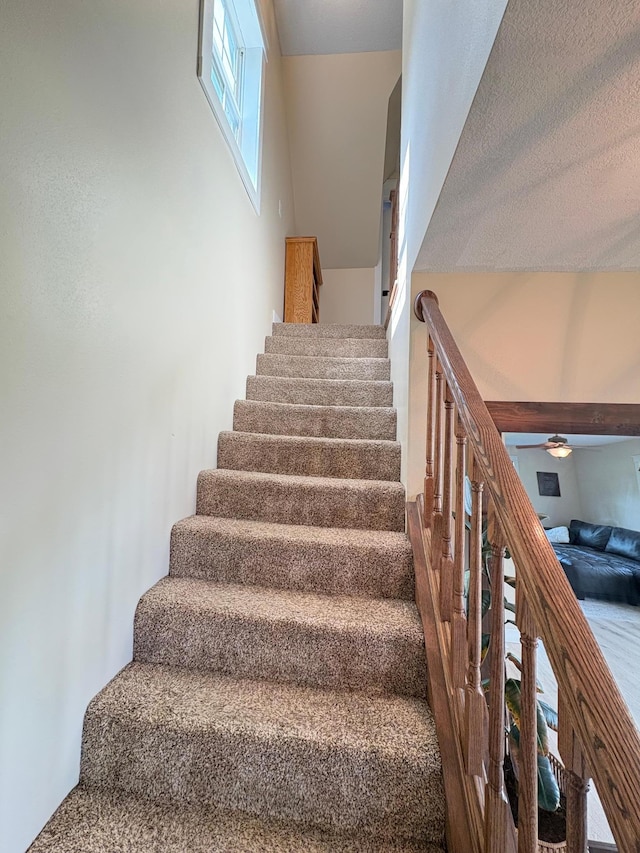 2812 150th St, Maxwell Twp, MN 56232 - staircase featuring a ceiling fan
