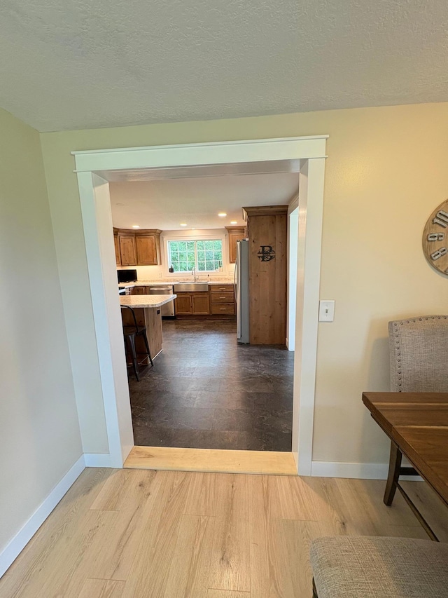 2812 150th St, Maxwell Twp, MN 56232 - corridor featuring dark wood-style floors