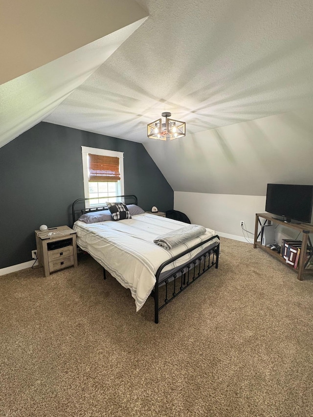 2812 150th St, Maxwell Twp, MN 56232 - carpeted bedroom with a textured ceiling and vaulted ceiling