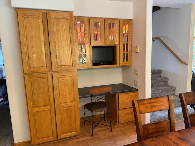 14158 185th Ave NE, Smiley Twp, MN 56701 - office with built in desk and wood finished floors