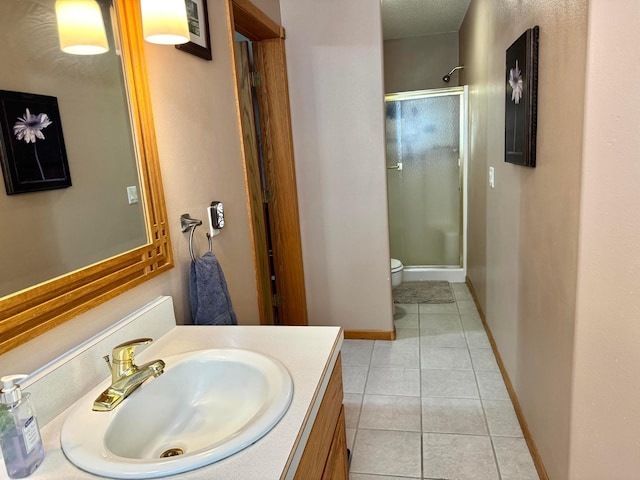 14158 185th Ave NE, Smiley Twp, MN 56701 - bathroom with a shower stall, vanity, and tile patterned floors