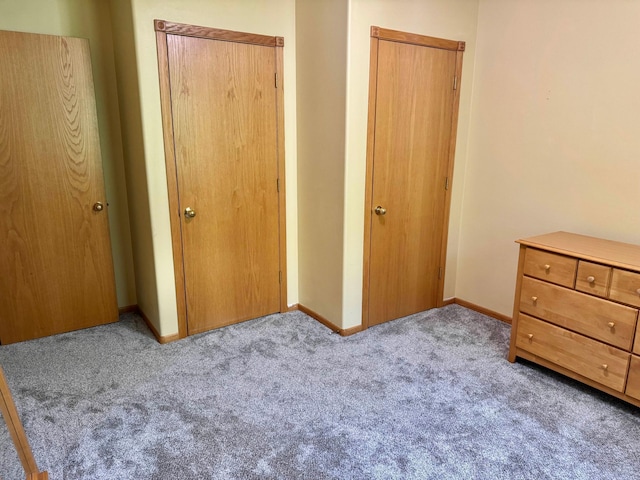 14158 185th Ave NE, Smiley Twp, MN 56701 - unfurnished bedroom with carpet flooring and baseboards
