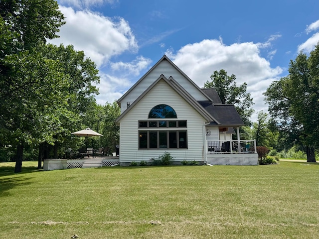 14158 185th Ave NE, Smiley Twp, MN 56701 - rear view of property with a lawn and a deck
