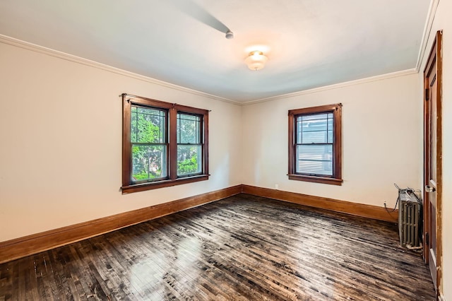 983 18th Ave SE, Minneapolis, MN 55414 - unfurnished room featuring healthy amount of natural light, dark wood-type flooring, and ornamental molding
