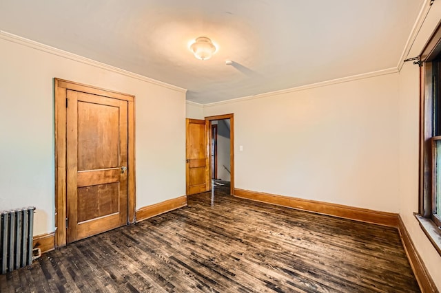 983 18th Ave SE, Minneapolis, MN 55414 - unfurnished bedroom featuring radiator heating unit, dark wood finished floors, and ornamental molding
