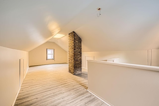 983 18th Ave SE, Minneapolis, MN 55414 - bonus room with lofted ceiling and light wood-style floors