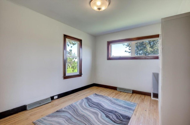 N7420 110th St, Spring Lake Twp, WI 54767 - unfurnished room featuring wood finished floors