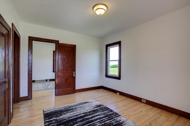 N7420 110th St, Spring Lake Twp, WI 54767 - unfurnished room featuring baseboards and light wood-type flooring