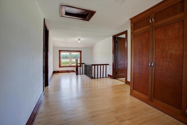 N7420 110th St, Spring Lake Twp, WI 54767 - corridor with attic access, an upstairs landing, and light wood-type flooring
