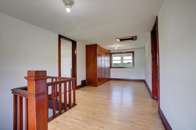 N7420 110th St, Spring Lake Twp, WI 54767 - hall featuring an upstairs landing and light wood-type flooring