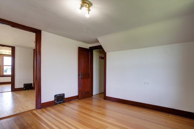 N7420 110th St, Spring Lake Twp, WI 54767 - empty room with light wood-style floors and baseboards