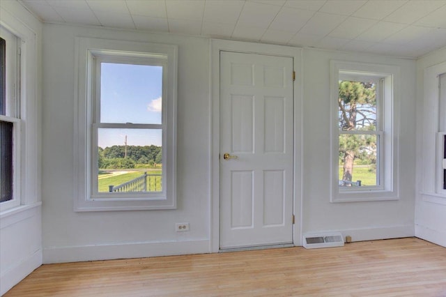 N7420 110th St, Spring Lake Twp, WI 54767 - unfurnished room featuring light wood-style flooring and baseboards