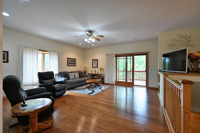 N5020 Red Pine Trl, Evergreen Twp, WI 54801 - living area with wood finished floors, plenty of natural light, a ceiling fan, and recessed lighting